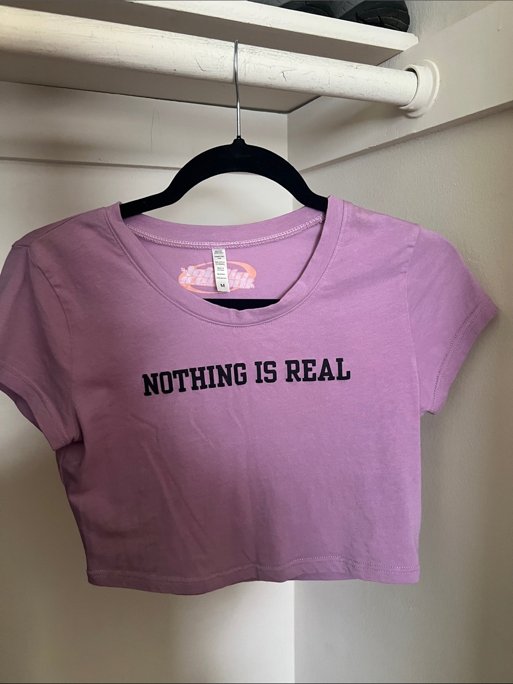 Lavender Baby Tee "Nothing Is Real"